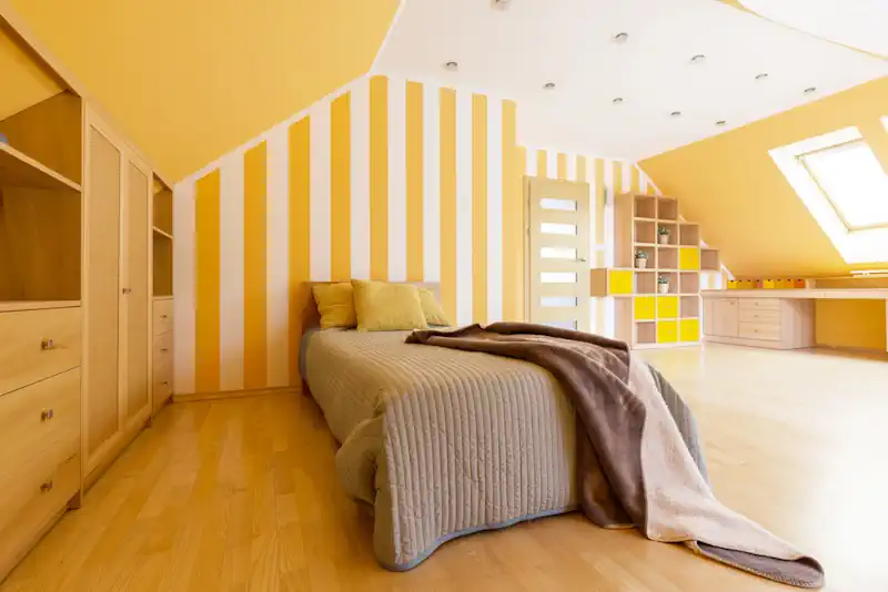 Attic Bedroom with Yellow Stripes