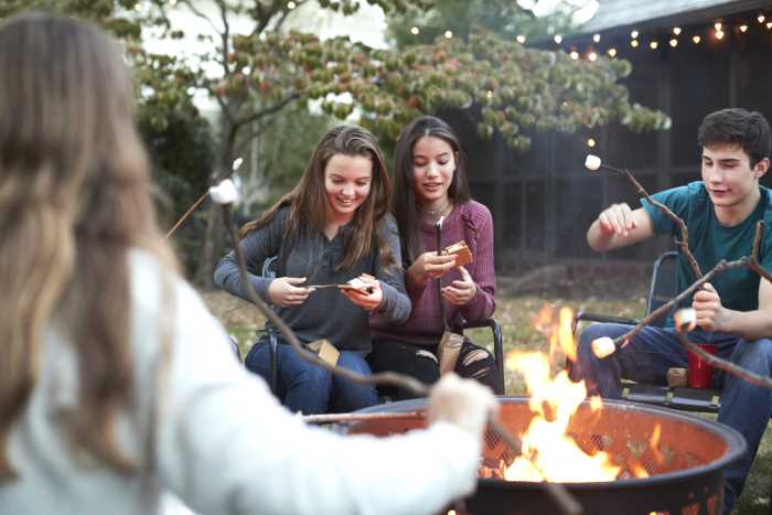 Roasting Marshmallows Around the Fire Pit